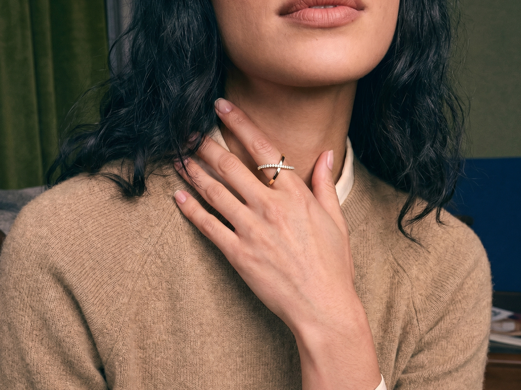 Custom lab-grown diamond engagement ring worn on the hand, close-up in natural light