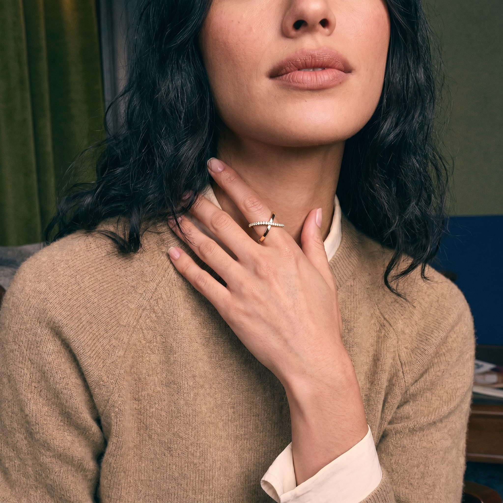 Custom lab-grown diamond engagement ring worn on the hand, close-up in natural light