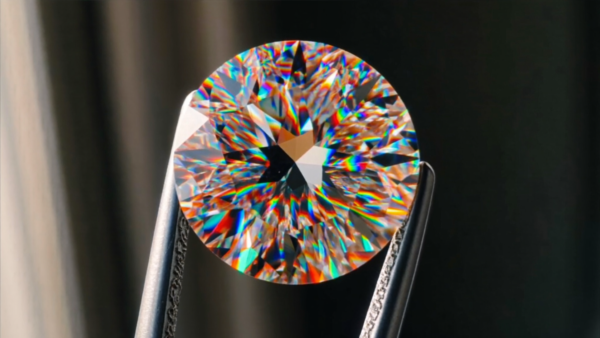 Macro close-up of a round brilliant lab-grown diamond, showing cut grade sparkle and fire
